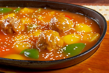 猪肉加甜辣酱菠萝桌子小吃异国香料味筷子胡椒餐厅食物蔬菜图片