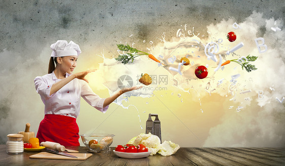 亚洲女性用魔法烹饪食物女士杯子魅力成人围裙空气面粉帽子沙拉图片