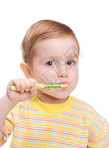 有牙科牙刷刷牙的小孩图片