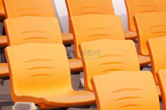 椅子民众场地橙子看台体育场竞赛黄色运动运动员团体图片