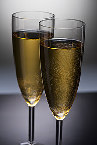 香槟杯魅力饮料派对气泡酒精金子香槟火花反射白酒图片