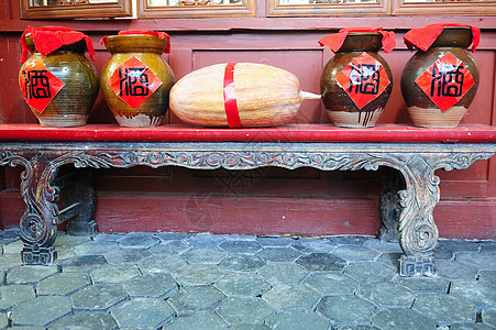 中国葡萄酒罐陶瓷制品陶器黏土木头饮料节日石头罐子水壶图片