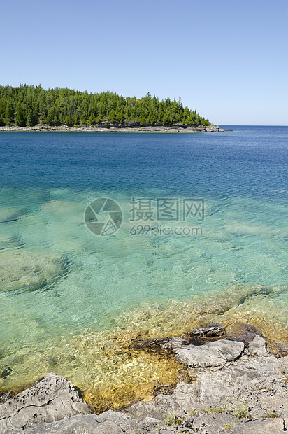 休伦湖绿色太阳岩石风景波浪公园灰色支撑森林悬崖图片