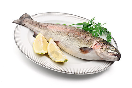 加柠檬的鳟鱼彩虹钓鱼红色尾巴烹饪营养香菜白色美食海鲜图片