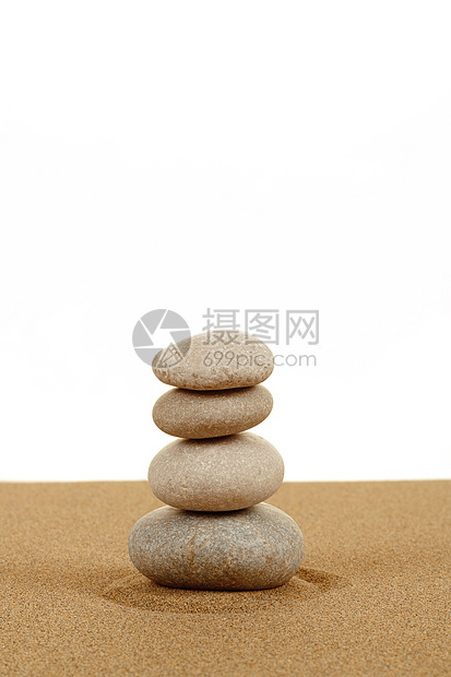 白沙中平衡的石块岩石海滩灵魂艺术专注生活卵石精神石头圆形图片