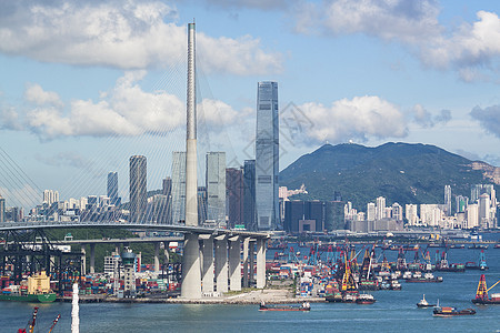 日复一日在香港的高速公路桥进口起重机天空商业运输集装箱风俗城市服务码头图片