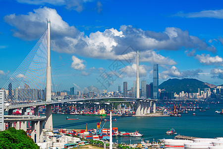 日复一日在香港的高速公路桥建筑港口天空贸易风俗加载安全起重机货物集装箱图片