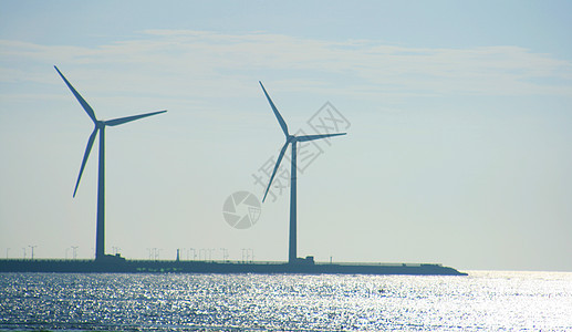 风力涡轮机场地电力油菜籽天空工程活力油菜全景风车蓝色图片