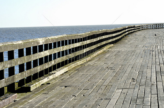 木制码头木材乡村海岸海洋孤独条纹地面木头棕色甲板图片