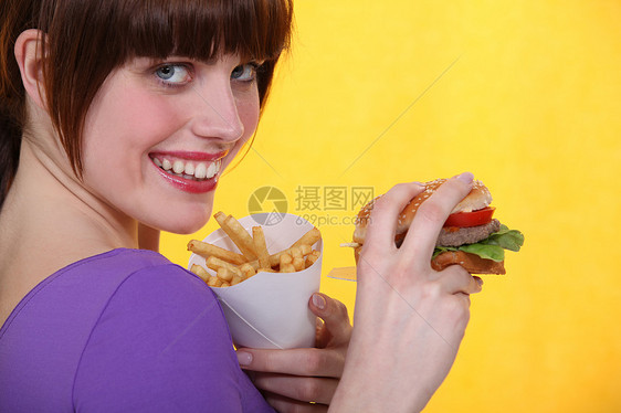 妇女吃垃圾食品快乐馅饼营养女孩女性饮食包子饥饿学生面包图片