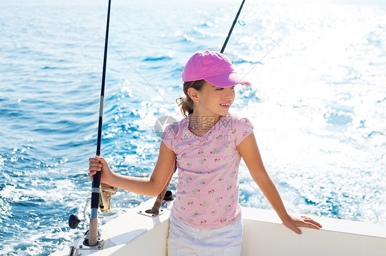 渔船渔船鱼棒中女童的航行情况微笑旅行女性水手童年海洋女孩钓鱼幸福渔夫图片