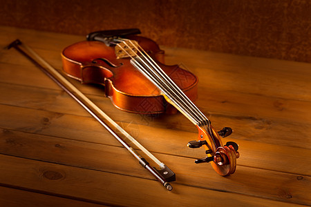 木木背景的经典音乐小提琴古老中提琴独奏笔记交响乐细绳古董音乐会风格艺术大提琴图片