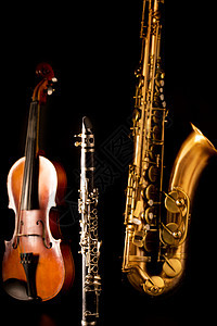 音乐 萨克斯特诺萨克斯式小提琴和黑色单簧管音乐家字符串乐队纽扣仪器蓝调反射钥匙爵士乐笔记图片