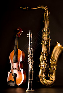 音乐 萨克斯特诺萨克斯式小提琴和黑色单簧管音乐家喇叭反射笔记爵士乐木头音乐会黄铜旋律萨克斯管图片