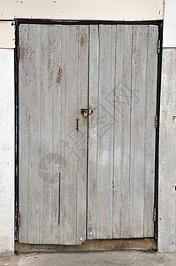 旧门古董风格装饰品出口石头风化建筑金属木头锁孔图片