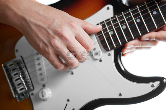 玩电吉他手指工作室黑色男性白色音乐家吉他手岩石棕色细绳图片