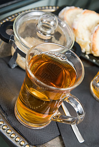 茶和蛋糕玻璃橙子垃圾液体杯子营养饼干甜点饮料压力图片
