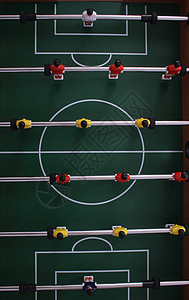 台表足球竞赛闲暇娱乐团队竞争玩家地面分数守门员黄色图片