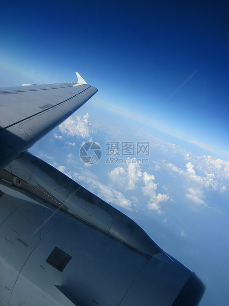 在天空中飞翔蓝色明信片游客天际假期航空公司旅行运输气氛自由图片