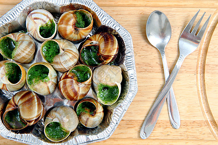 蜗牛插画像法国美食一样的蜗牛黄油田螺健康花园香菜文化服务食物烹饪厨师背景