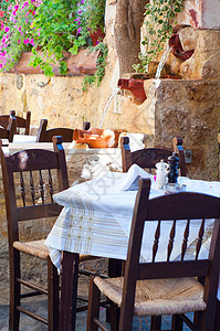 Greek酒馆建筑学街道咖啡店餐厅咖啡馆旅游花朵场景椅子桌子图片