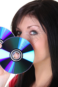 妇女持有CD光盘女士音乐格式眼睛圆形头发鼻子隐藏贮存图片
