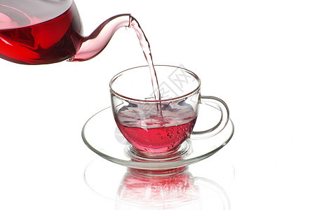 茶茶壶水平红色液体棕色橙子白色一杯茶概念叶子图片