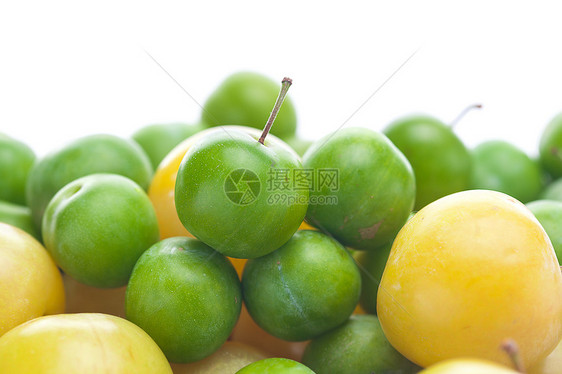 绿色和黄色李子背景食物紫色季节水果甜点团体杂货生产小吃果味图片