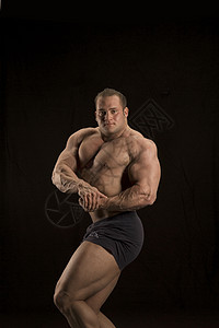 身体构造器男人手臂肌肉二头肌健身房力量哑铃起重背景图片
