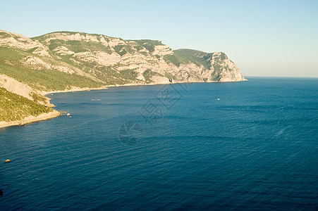 黑海海岸日落晴天支撑爬坡杂草金子高度灌木地平线图片