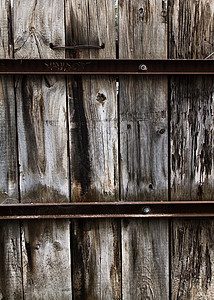旧木林围栏纹理棕色木头框架宏观金属栅栏背景图片