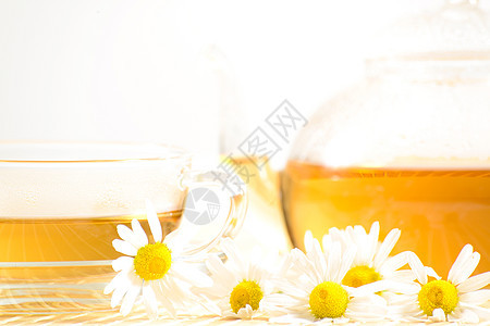 茶杯加香草甘菊茶照片卫生饮料草本植物橙子早餐时间礼物液体药品图片