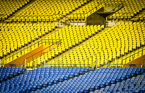 空体育座椅竞技场黄色剧院游戏体育场观众塑料长椅建筑学运动图片
