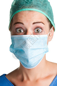 戴着面罩的女外科医生惊讶医疗照顾者保健危险帮助惊喜养护卫生药品情况图片