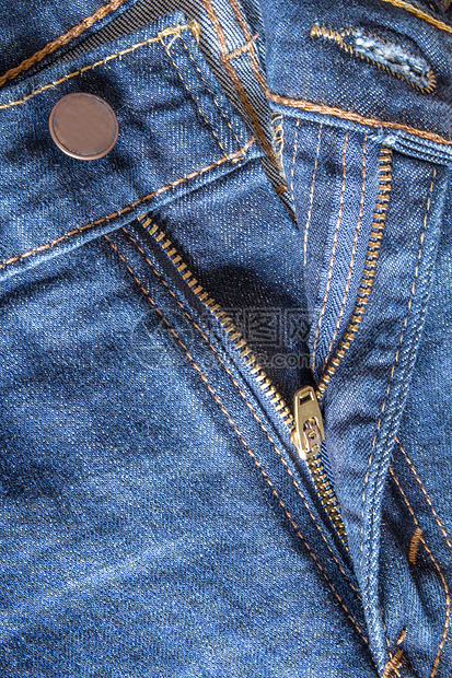 蓝琴手的拉链宏观紧固件合金衣服摄影裤子牛仔裤金属蓝色物体图片