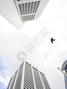 新加坡摩天大楼蓝色飞行生活玻璃窗户商业天空市中心公司金融图片
