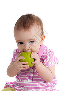 粉红吃苹果的小女孩宝宝粉色幸福童年女性孩子绿色乐趣婴儿女孩白色图片