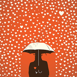 男人在雨伞下 在红心上的男人使雨滴图片