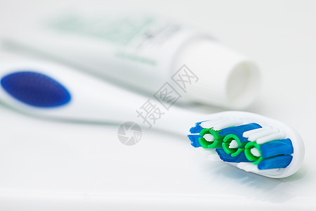 牙刷和管的闭合图像预防宏观修饰牙医打扫牙科呼吸牙膏药品蓝色图片
