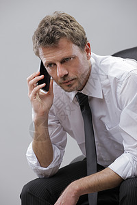 成熟商业人正装男人人士美容生意人电话商务专注上班族经理图片