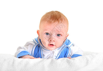 惊讶的婴儿男孩宝贝童年男生金发男性儿子毯子孩子说谎蓝色图片
