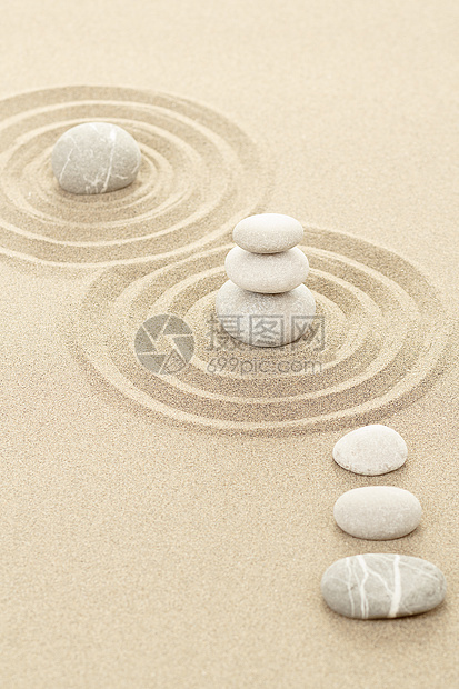 沙中平衡的石块岩石灵魂精神团体头脑场景专注圆形海滩艺术图片