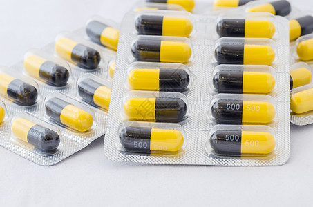 黑色和黄色胶囊剂量团体药品药店疾病制药宏观图片