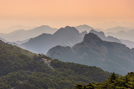 黄山日落岩石树木晴天网站旅游文化太阳红色斑点历史图片