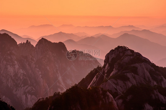 黄山日落树木红色网站风景斑点晴天历史文化旅游太阳图片