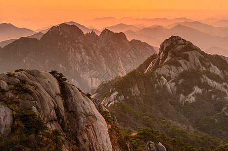 黄山日落树木太阳红色旅游网站石头风景晴天岩石文化图片