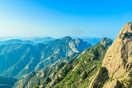 黄山和树石头岩石风景斑点蓝色文化太阳历史天空红色图片