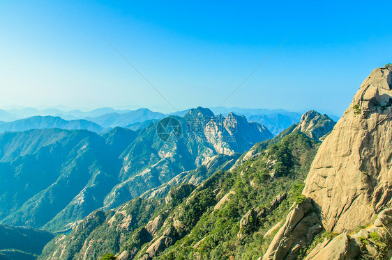 黄山和树石头岩石风景斑点蓝色文化太阳历史天空红色图片