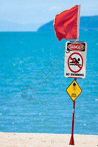 Jelly鱼类警告标志荒野瓶子冒险海岸线危险蓝色烧伤路标海洋天空图片