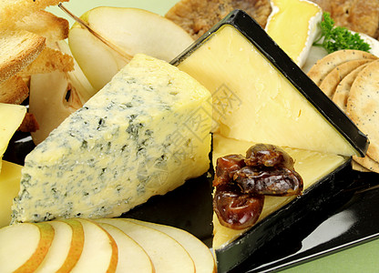 奶酪拼盘营养蓝脉面包烹饪味道午餐美食食物饼干灰布背景图片